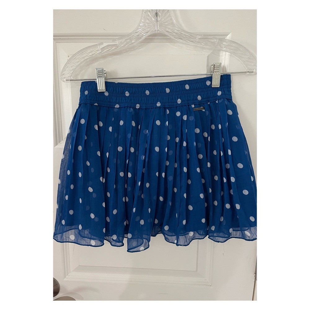 Polka dot skirt.
